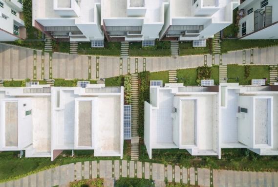 An overview shot of the Gran Carmen villas surrounded by greenscapes and walkways.
